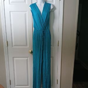 Ropalia teal sleeveless  jumpsuit with side pockets  Sz L EUC